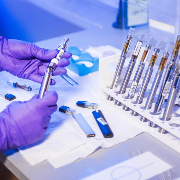 diagnostic lab hand holding tools.jpg